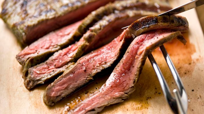 A food handler is slicing roast beef for 6 hours